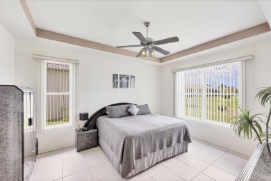 MUST SEE!  GORGEOUS LAKE VIEWS WITH SUNSET EXPOSURE!  DON'T MISS on Pelican Pointe Golf and Country Club in Florida - for sale on GolfHomes.com, golf home, golf lot