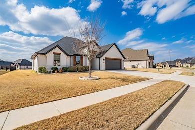 Stunning single story Couto Home in desirable Harbor Lakes on Harbor Lakes Golf Club in Texas - for sale on GolfHomes.com, golf home, golf lot