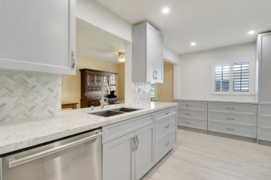 This charming 2-bedroom, 2-bathroom home in Palm Beach on Leisureville Community Golf Course in Florida - for sale on GolfHomes.com, golf home, golf lot
