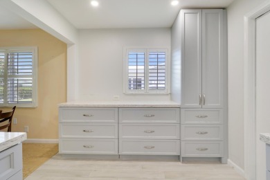 This charming 2-bedroom, 2-bathroom home in Palm Beach on Leisureville Community Golf Course in Florida - for sale on GolfHomes.com, golf home, golf lot