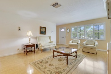 This charming 2-bedroom, 2-bathroom home in Palm Beach on Leisureville Community Golf Course in Florida - for sale on GolfHomes.com, golf home, golf lot