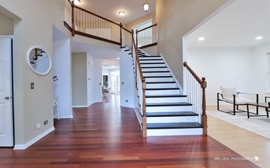 From the moment you arrive, the wrap-around porch invites you to on White Deer Run Golf Club in Illinois - for sale on GolfHomes.com, golf home, golf lot