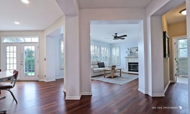 From the moment you arrive, the wrap-around porch invites you to on White Deer Run Golf Club in Illinois - for sale on GolfHomes.com, golf home, golf lot