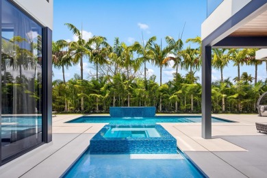 1955 Thatch Palm in Royal Palm Yacht & Country Club is a on Boca Raton Resort and Club in Florida - for sale on GolfHomes.com, golf home, golf lot