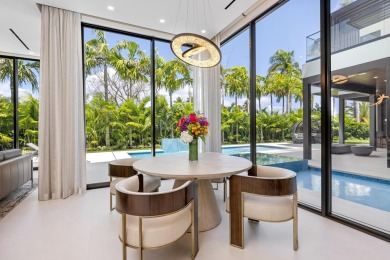 1955 Thatch Palm in Royal Palm Yacht & Country Club is a on Boca Raton Resort and Club in Florida - for sale on GolfHomes.com, golf home, golf lot