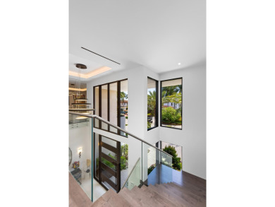 1955 Thatch Palm in Royal Palm Yacht & Country Club is a on Boca Raton Resort and Club in Florida - for sale on GolfHomes.com, golf home, golf lot