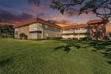 Turnkey 2BR/2BA corner condo in Vista Royale, a desirable 55+ on The American Golf Club in Florida - for sale on GolfHomes.com, golf home, golf lot