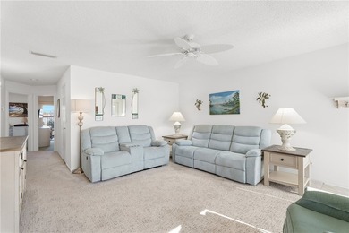 Turnkey 2BR/2BA corner condo in Vista Royale, a desirable 55+ on The American Golf Club in Florida - for sale on GolfHomes.com, golf home, golf lot