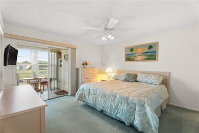 Turnkey 2BR/2BA corner condo in Vista Royale, a desirable 55+ on The American Golf Club in Florida - for sale on GolfHomes.com, golf home, golf lot