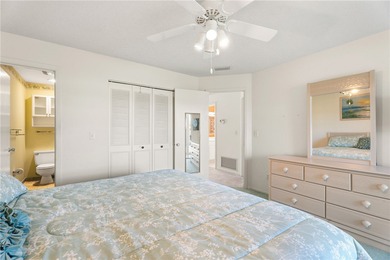 Turnkey 2BR/2BA corner condo in Vista Royale, a desirable 55+ on The American Golf Club in Florida - for sale on GolfHomes.com, golf home, golf lot