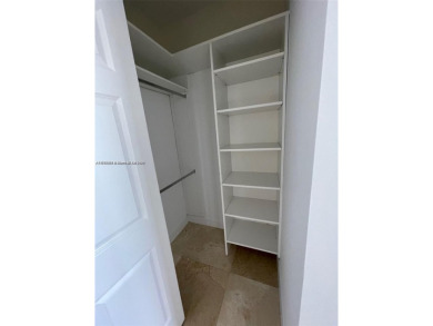 Updated 3-bed, 2-bath corner unit (built in 2007) overlooking on The Diplomat Golf Resort and Spa in Florida - for sale on GolfHomes.com, golf home, golf lot