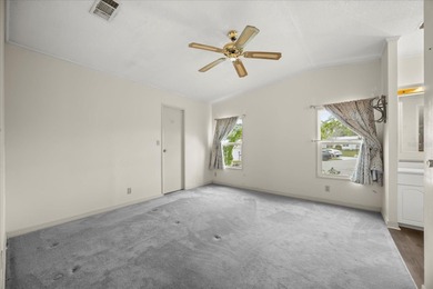 Rare opportunity in Zellwood Station! This 2-bedroom 1990 home on Zellwood Station Country Club in Florida - for sale on GolfHomes.com, golf home, golf lot