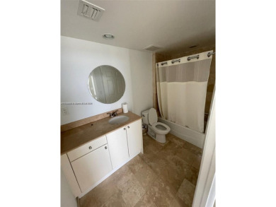 Updated 3-bed, 2-bath corner unit (built in 2007) overlooking on The Diplomat Golf Resort and Spa in Florida - for sale on GolfHomes.com, golf home, golf lot