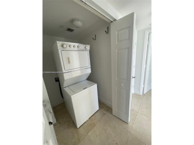 Updated 3-bed, 2-bath corner unit (built in 2007) overlooking on The Diplomat Golf Resort and Spa in Florida - for sale on GolfHomes.com, golf home, golf lot