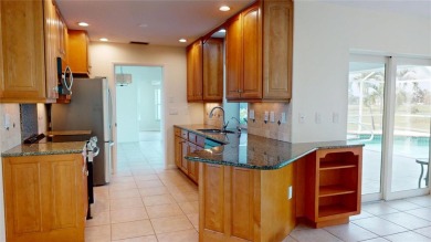 Be a part of Burnt Store Isles in this beautiful home located on on Twin Isles Country Club in Florida - for sale on GolfHomes.com, golf home, golf lot