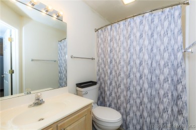 Welcome to your lake escape! This beautiful, first floor, 3-bed on Bear Creek Valley Golf Club in Missouri - for sale on GolfHomes.com, golf home, golf lot