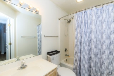 Welcome to your lake escape! This beautiful, first floor, 3-bed on Bear Creek Valley Golf Club in Missouri - for sale on GolfHomes.com, golf home, golf lot