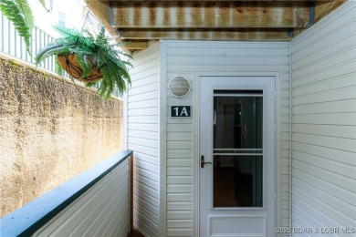 Welcome to your lake escape! This beautiful, first floor, 3-bed on Bear Creek Valley Golf Club in Missouri - for sale on GolfHomes.com, golf home, golf lot
