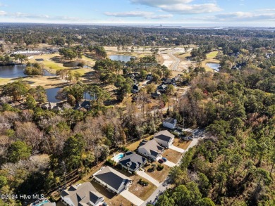 Beautiful custom-built home by Whitney Blair in Cape Side at on Pearl Golf Links in North Carolina - for sale on GolfHomes.com, golf home, golf lot