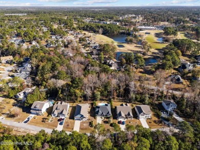 Beautiful custom-built home by Whitney Blair in Cape Side at on Pearl Golf Links in North Carolina - for sale on GolfHomes.com, golf home, golf lot