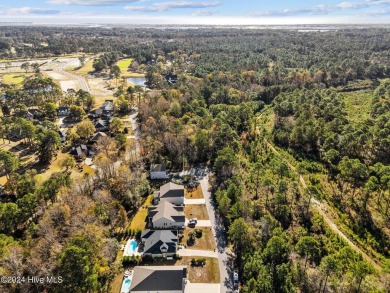 Beautiful custom-built home by Whitney Blair in Cape Side at on Pearl Golf Links in North Carolina - for sale on GolfHomes.com, golf home, golf lot