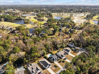 Beautiful custom-built home by Whitney Blair in Cape Side at on Pearl Golf Links in North Carolina - for sale on GolfHomes.com, golf home, golf lot