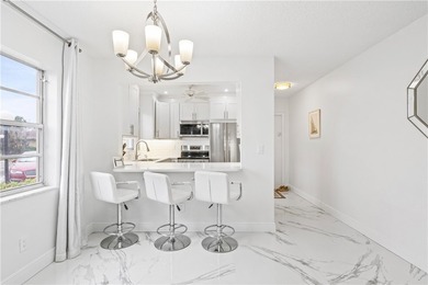 Rarely available, completely renovated modern condo in Vista on The American Golf Club in Florida - for sale on GolfHomes.com, golf home, golf lot