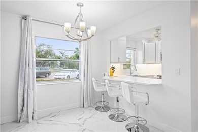 Rarely available, completely renovated modern condo in Vista on The American Golf Club in Florida - for sale on GolfHomes.com, golf home, golf lot
