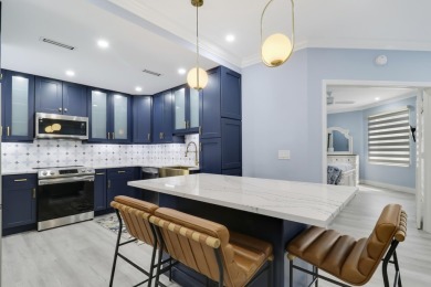 WOW! HIGHLY SOUGHT AFTER & rarely avail PET FRIENDLY END UNIT on on Jupiter Dunes Golf Course in Florida - for sale on GolfHomes.com, golf home, golf lot