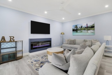 WOW! HIGHLY SOUGHT AFTER & rarely avail PET FRIENDLY END UNIT on on Jupiter Dunes Golf Course in Florida - for sale on GolfHomes.com, golf home, golf lot