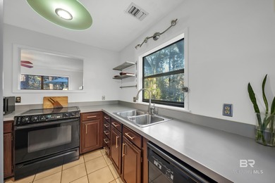 Welcome to your peaceful cottage in the woods, a private oasis on Lake Forest Yacht and Country Club in Alabama - for sale on GolfHomes.com, golf home, golf lot