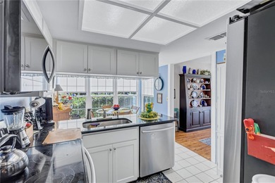 Welcome to this stunning two bedroom two bath villa nestled in a on Highland Lakes Executive Golf Course in Florida - for sale on GolfHomes.com, golf home, golf lot