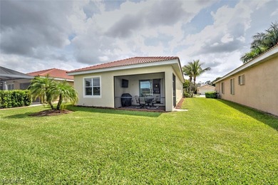 This open and bright home features high ceilings, abundant on Herons Glen Golf and Country Club in Florida - for sale on GolfHomes.com, golf home, golf lot