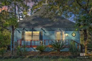 Welcome to your peaceful cottage in the woods, a private oasis on Lake Forest Yacht and Country Club in Alabama - for sale on GolfHomes.com, golf home, golf lot