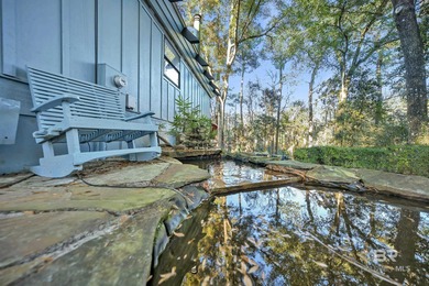 Welcome to your peaceful cottage in the woods, a private oasis on Lake Forest Yacht and Country Club in Alabama - for sale on GolfHomes.com, golf home, golf lot