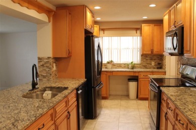 This is a very special remodeled, Drayton, single family home on Mainlands Golf Club in Florida - for sale on GolfHomes.com, golf home, golf lot