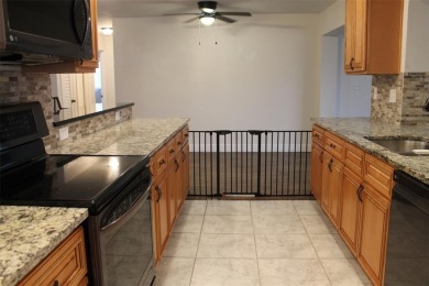 This is a very special remodeled, Drayton, single family home on Mainlands Golf Club in Florida - for sale on GolfHomes.com, golf home, golf lot