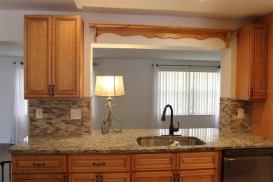 This is a very special remodeled, Drayton, single family home on Mainlands Golf Club in Florida - for sale on GolfHomes.com, golf home, golf lot