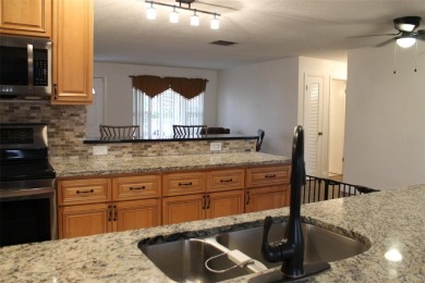 This is a very special remodeled, Drayton, single family home on Mainlands Golf Club in Florida - for sale on GolfHomes.com, golf home, golf lot