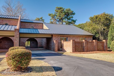 ***NEW PHOTOS. Breath taking views over the pond behind the on Country Club of Landfall in North Carolina - for sale on GolfHomes.com, golf home, golf lot