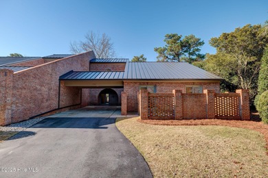 ***NEW PHOTOS. Breath taking views over the pond behind the on Country Club of Landfall in North Carolina - for sale on GolfHomes.com, golf home, golf lot