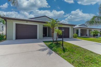 Beautifully Maintained 2-bed, 2-bath home in the welcoming 55+ on Spanish Lakes I in Florida - for sale on GolfHomes.com, golf home, golf lot