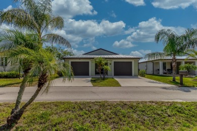 Beautifully Maintained 2-bed, 2-bath home in the welcoming 55+ on Spanish Lakes I in Florida - for sale on GolfHomes.com, golf home, golf lot