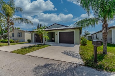 Beautifully Maintained 2-bed, 2-bath home in the welcoming 55+ on Spanish Lakes I in Florida - for sale on GolfHomes.com, golf home, golf lot