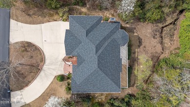 Take in peaceful views of Lake Pinehurst at this inviting, all on Pinehurst Resort and Country Club in North Carolina - for sale on GolfHomes.com, golf home, golf lot