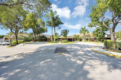 Spacious 1-bedroom, 1.5-bath first-floor condo offering serene on Sunrise Lakes Phase III in Florida - for sale on GolfHomes.com, golf home, golf lot