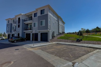 Sunny, corner-unit townhome perfectly positioned to enjoy the on Pine Creek Golf Club in Colorado - for sale on GolfHomes.com, golf home, golf lot