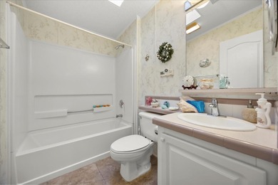 Stunning 3BR/2BA Triple-Wide with Versatile Bonus Room. This on Zellwood Station Country Club in Florida - for sale on GolfHomes.com, golf home, golf lot