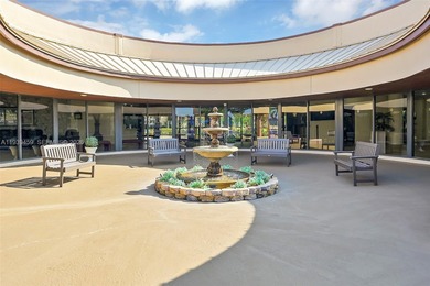 Spacious 1-bedroom, 1.5-bath first-floor condo offering serene on Sunrise Lakes Phase III in Florida - for sale on GolfHomes.com, golf home, golf lot