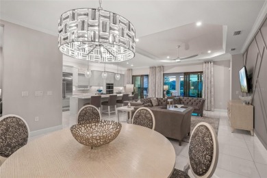Water View, IMPACT GLASS WINDOWS  DOORS, and fully-loaded with on Esplanade Golf and Country at Lakewood Ranch in Florida - for sale on GolfHomes.com, golf home, golf lot